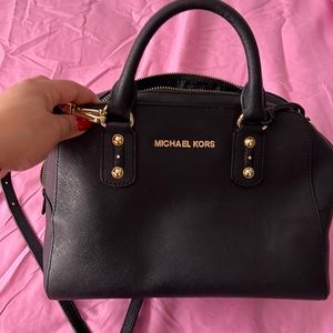 Michael Kors medium size black bag .